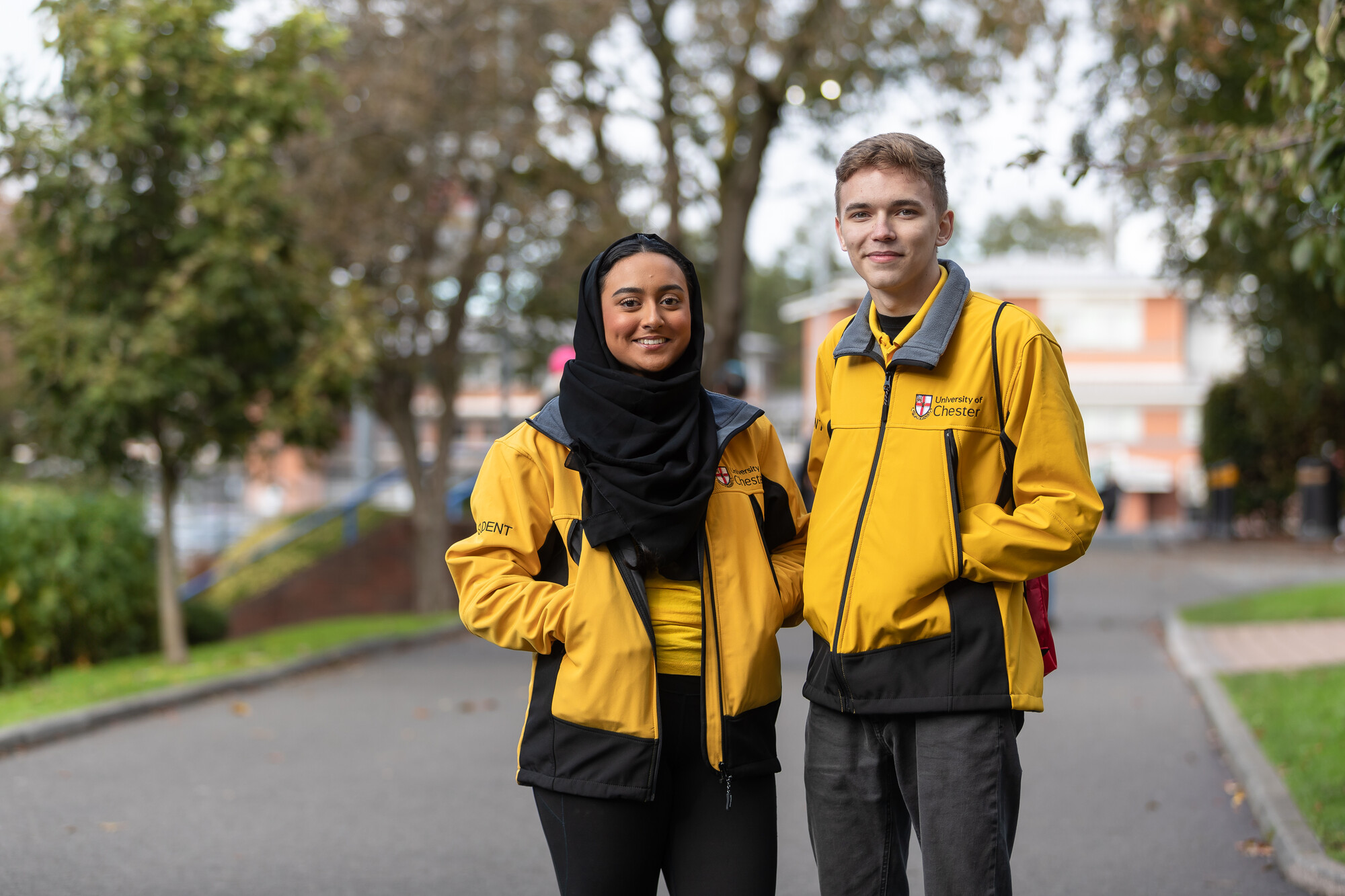 Two Student Ambassadors stood together outside at Exton Park