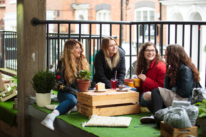 Students Outside having a coffee