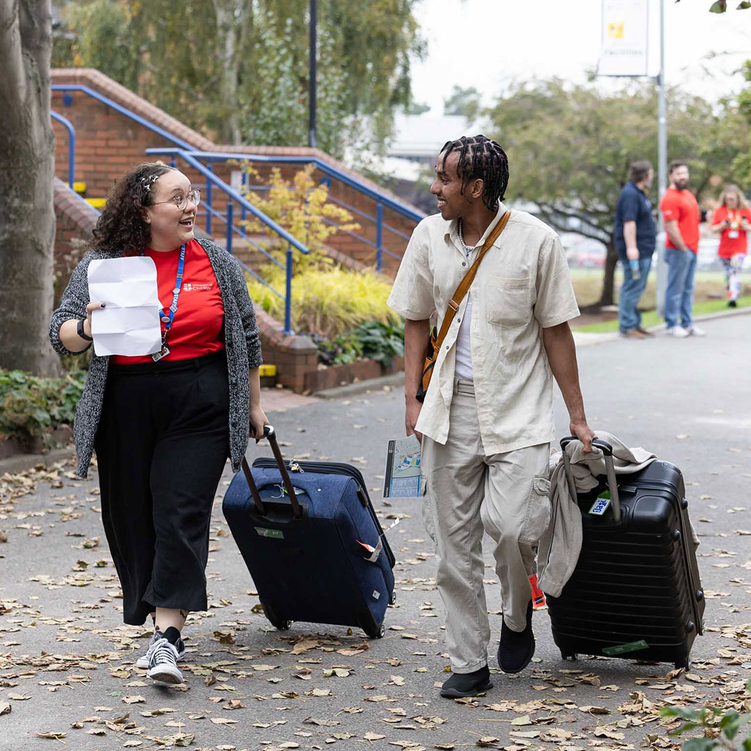 Student Arriving with Suitcase
