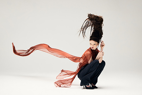 A graduate student in fashion design clothes