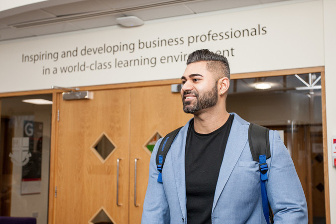 MSc Marketing Student in Bridge House, Queens Park, outside the Library
