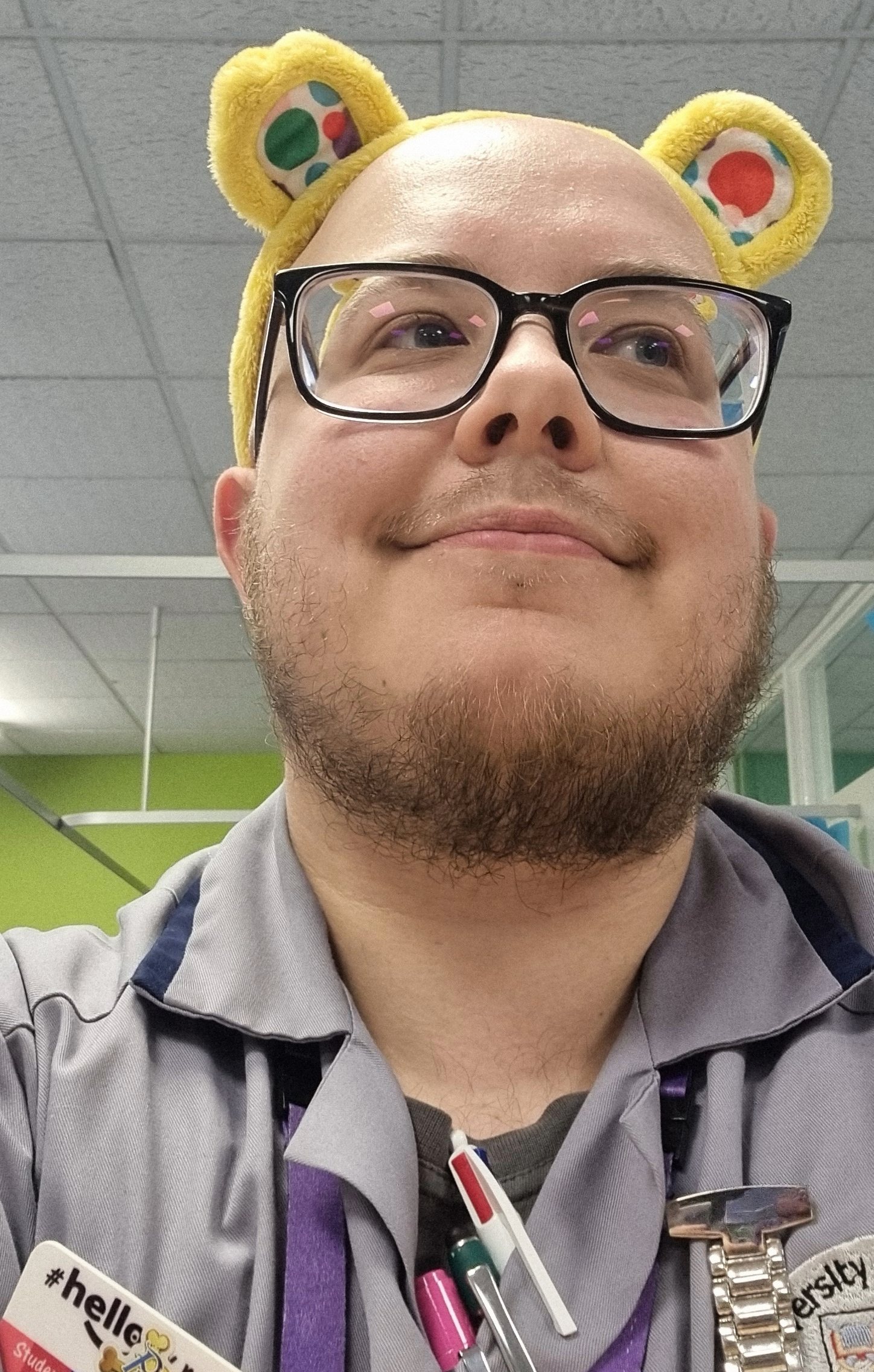 A nursing student wearing 'Pudsey Bear' ears for Children in Need