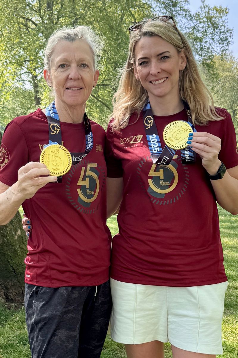 Becky Richardson and Ann Delve with their London Marathon medals.