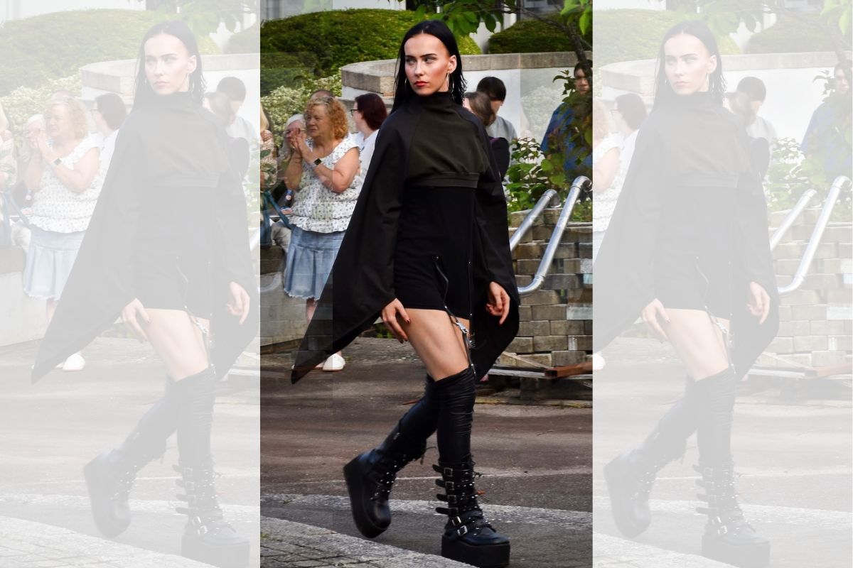 A dance student modelling at a University fashion show.