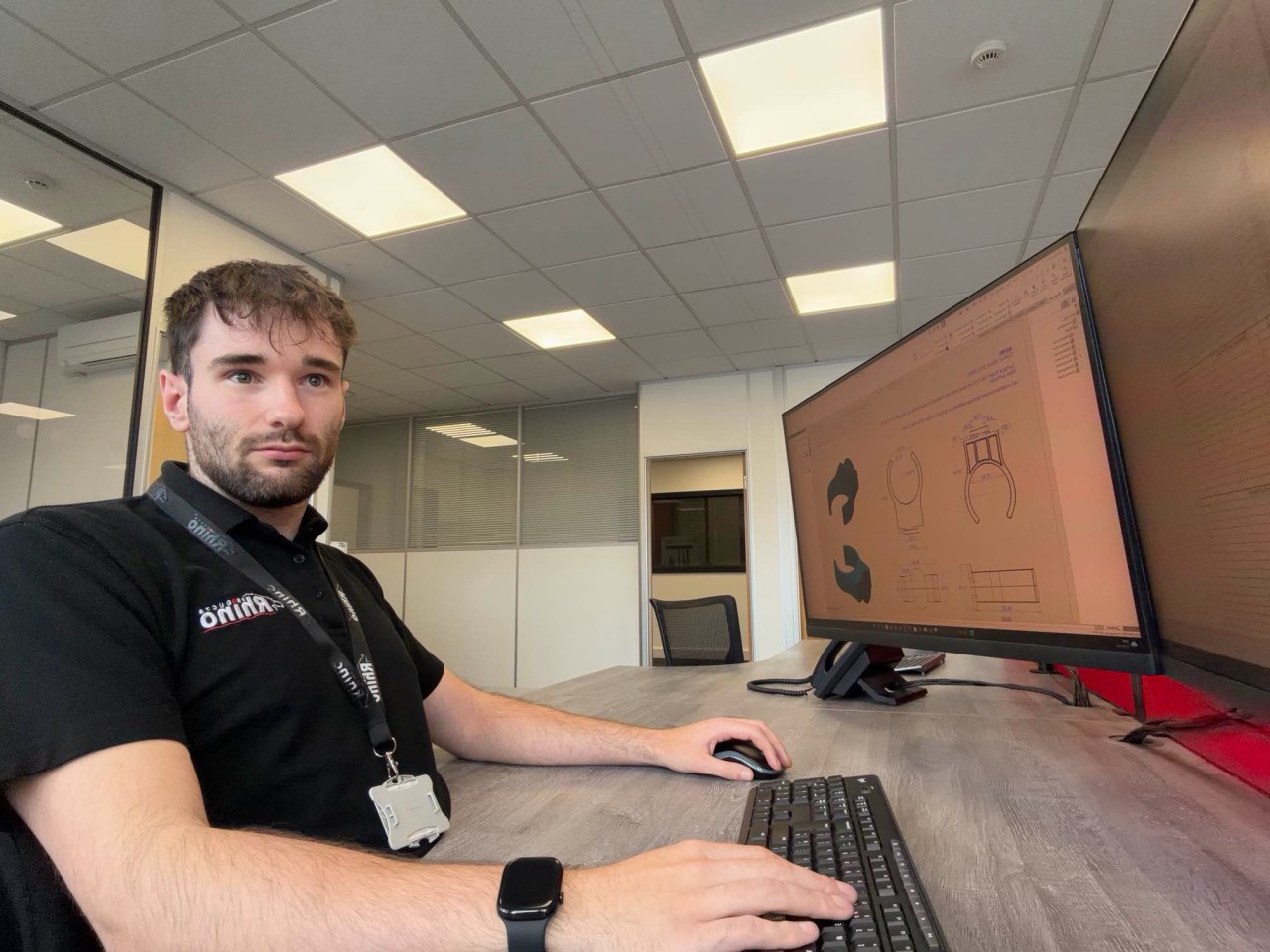 student in workplace at computer