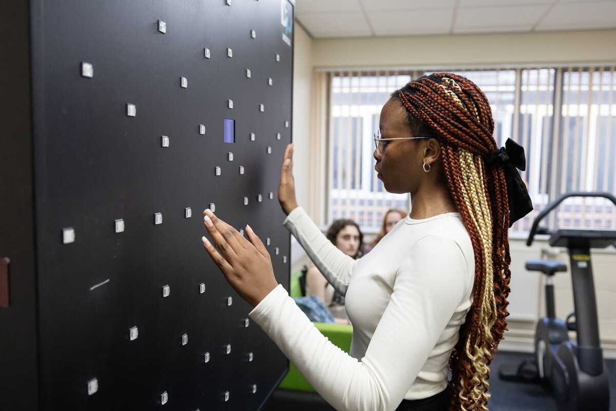 A psychology student in a lab