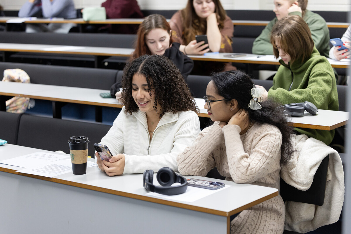 Psychology Students on phone during a Psychology Demo