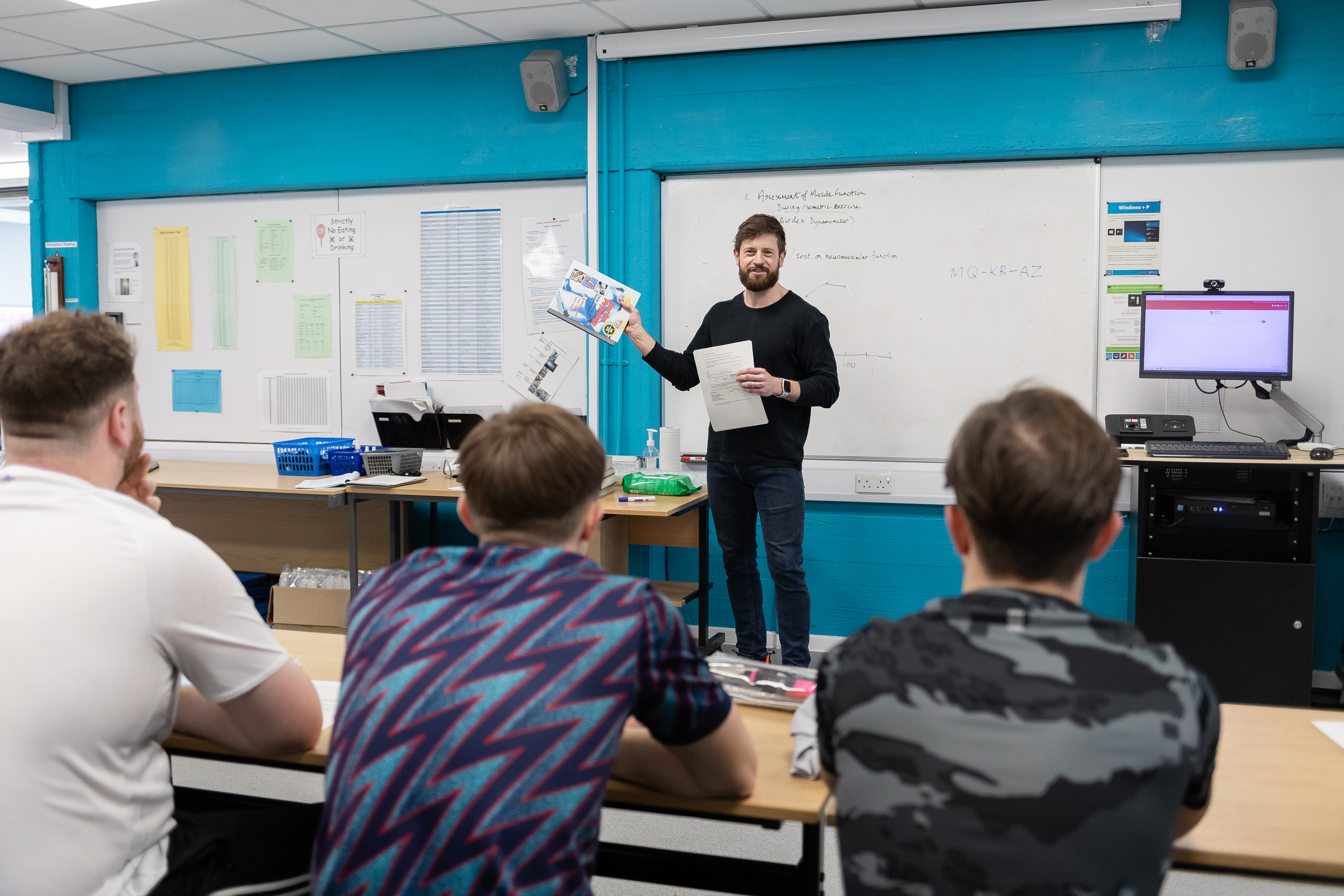 Staff member talking in a physiology session
